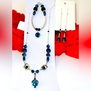 Blue and silver necklace earring and bracelet set. $50